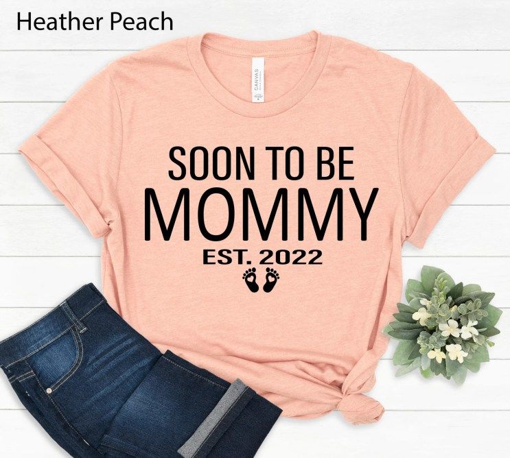 Peach colored surrogacy shirt with soon to be mommy written on front