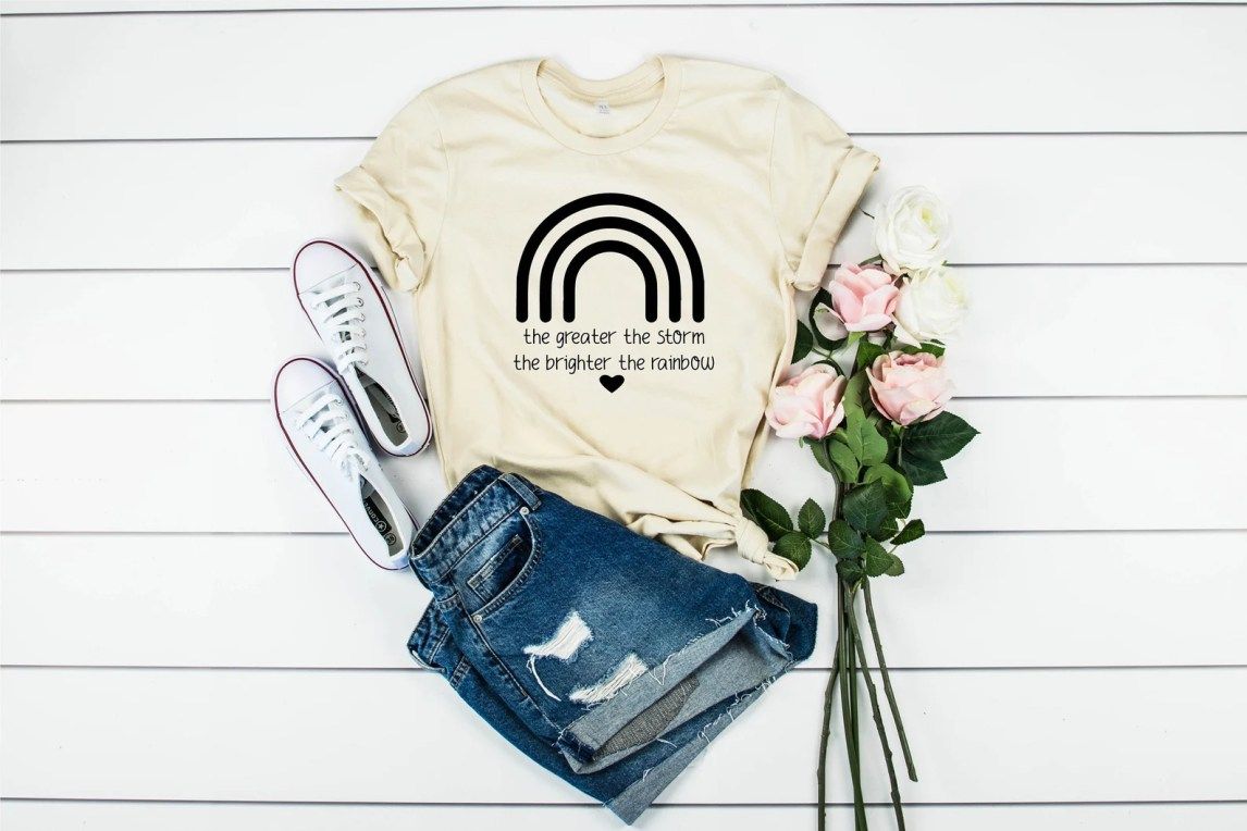 Light yellow greater the storm the brighter the rainbow surrogacy shirt